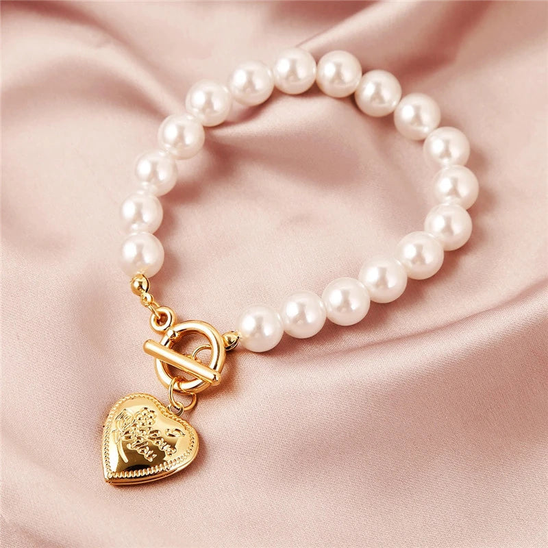 Bracelet Majestueux en Perles et Coeur d'Or