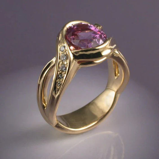 Bague en or avec cristal de grenat et zircone