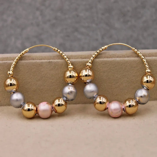 Boucles d'oreilles en or avec perles vintage