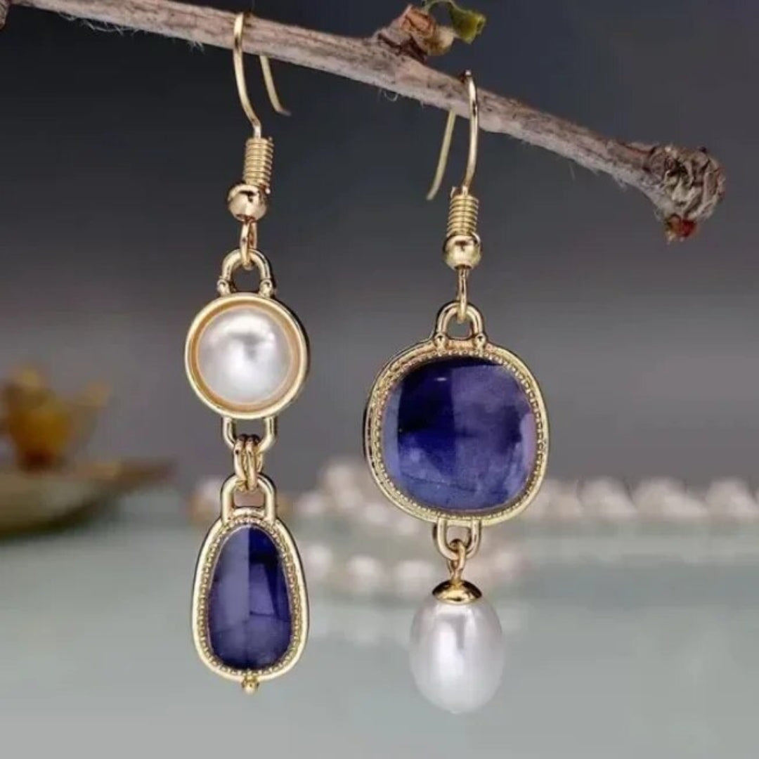 Boucles d'oreilles vintage en or avec pierres bleues