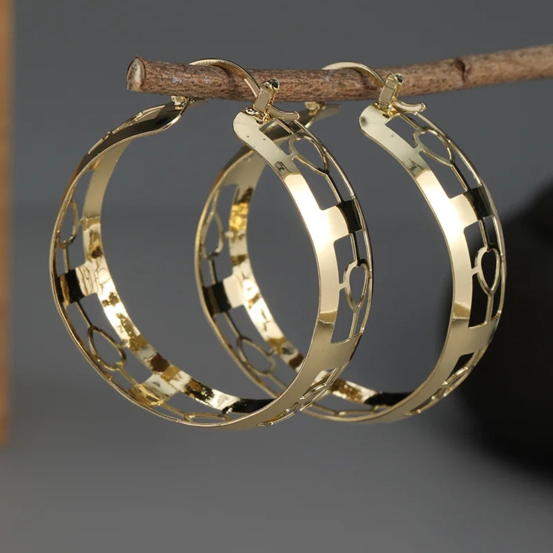 Boucles d'oreilles creuses vintage en or et argent
