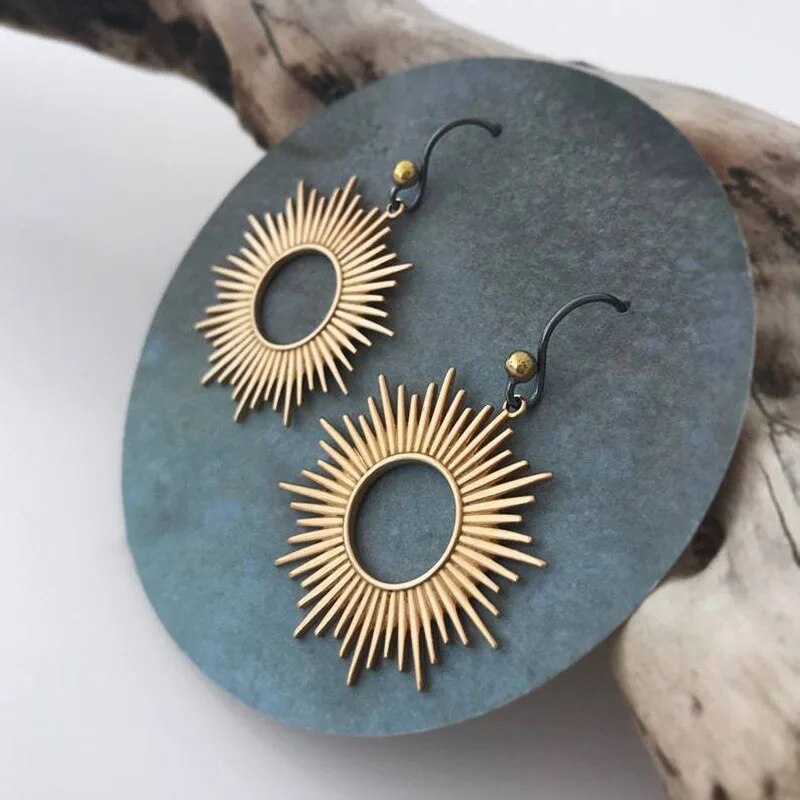 Boucles d'oreilles soleil vintage en or