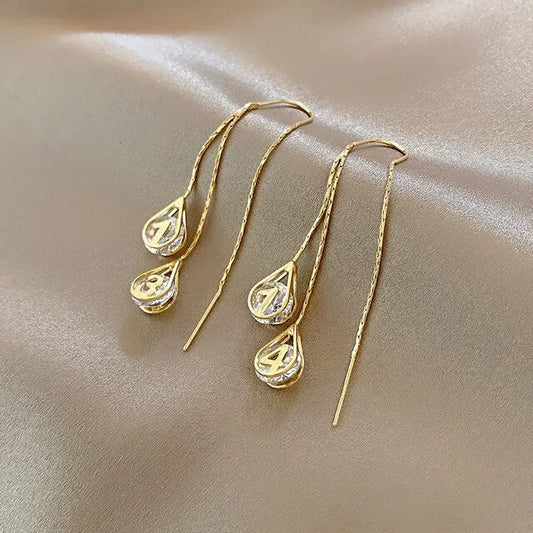 Boucles d'oreilles pendantes en chiffres élégants