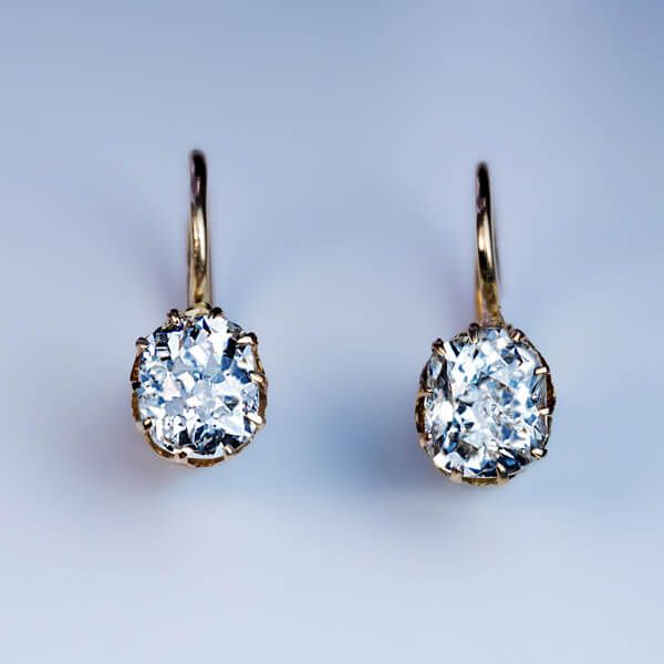 Boucles d'oreilles vintage avec diamant solitaire