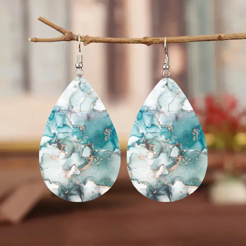 Boucles d'oreilles vintage en pierre blanche bleue