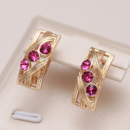 Boucles d'oreilles élégantes en or avec zirconias grenat