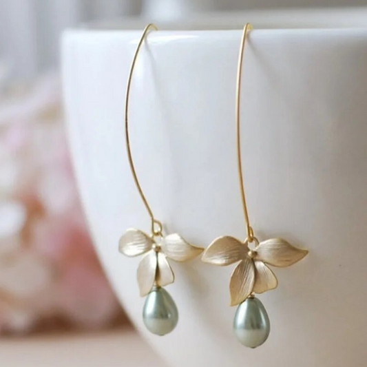 Boucles d'oreilles élégantes et pendantes en perles d'olivier