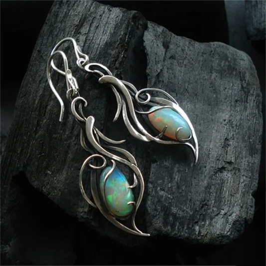 Boucles d'oreilles en argent vintage avec opale bleue