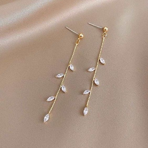 Boucles d'oreilles élégantes avec pendentif en zirconium